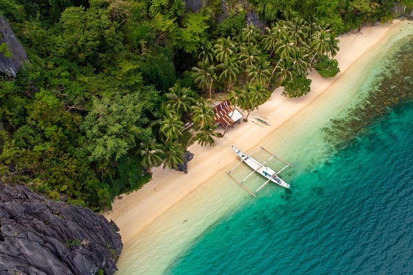 A Beautiful Framed Picture Of A Beach Side Of An Island - Image 3